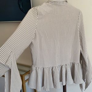 Light brown button up blouse with detailed arms by Gracia